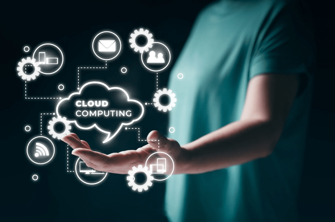 Hand holding icons of cloud computing, email, Wi-Fi, and mobile technology